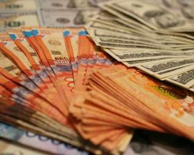 Средневзвешенный курс доллара вырос до 184,75 тенге